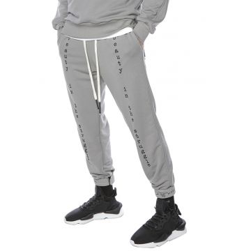 Pantaloni sport cu broderie text Atlas