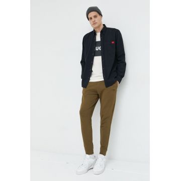 HUGO pantaloni de trening din bumbac barbati, culoarea verde, neted