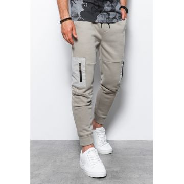 Pantaloni din amestec de bumbac cu buzunare laterale cu fermoar