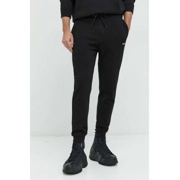 HUGO pantaloni de trening din bumbac barbati, culoarea negru, neted