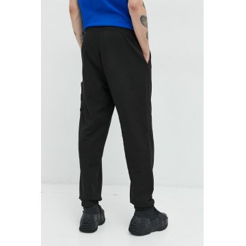 Tommy Jeans pantaloni de trening din bumbac barbati, culoarea negru, neted