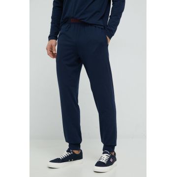 HUGO pantaloni de pijama barbati, culoarea albastru marin, neted