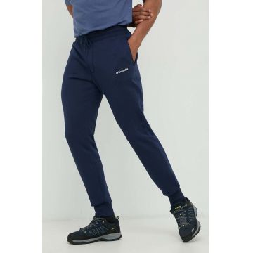 Columbia pantaloni de trening barbati, culoarea albastru marin, neted