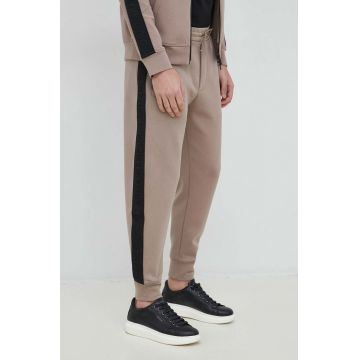 Emporio Armani pantaloni de trening barbati, culoarea bej, cu imprimeu