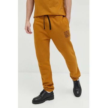 HUGO pantaloni de trening din bumbac barbati, culoarea maro, neted