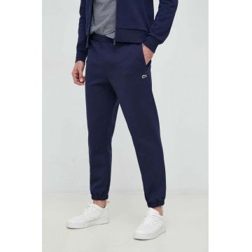 Lacoste pantaloni de trening culoarea albastru marin, melanj