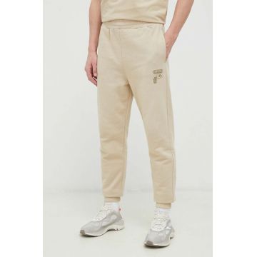 Fila pantaloni de trening din bumbac culoarea bej, neted