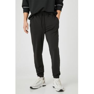 Pantaloni sport cu talie ajustabila