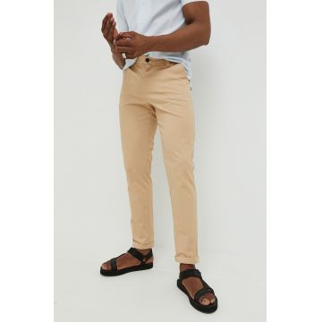 Tommy Jeans pantaloni barbati, culoarea bej, mulata