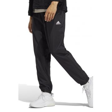 Pantaloni sport cu fermoare la terminatii
