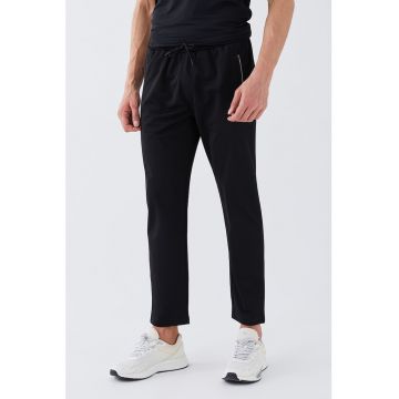 Pantaloni sport cu buzunare cu fermoar