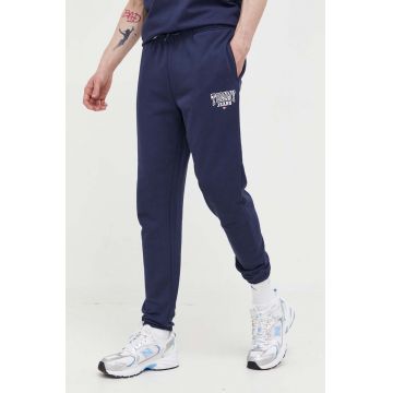 Tommy Jeans pantaloni de bumbac culoarea albastru marin, neted