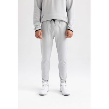 Pantaloni sport cu buzunare cu fermoar