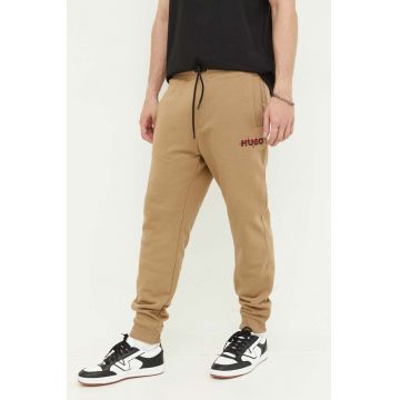 HUGO pantaloni de trening culoarea bej, cu imprimeu