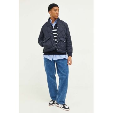 Tommy Jeans geaca de puf barbati, culoarea albastru marin, de tranzitie