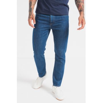 Blugi cu croiala conica si model cu 5 buzunare