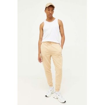 Tommy Jeans pantaloni de trening culoarea bej, cu imprimeu