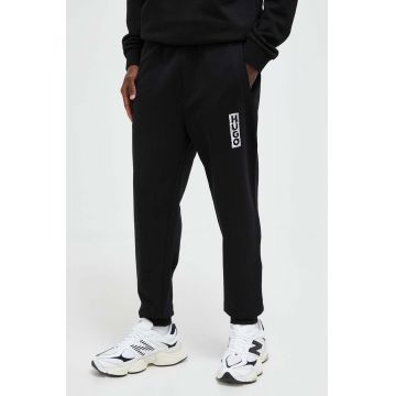 HUGO pantaloni de trening din bumbac culoarea negru, cu imprimeu