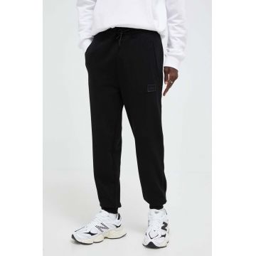 HUGO pantaloni de trening din bumbac culoarea negru, neted