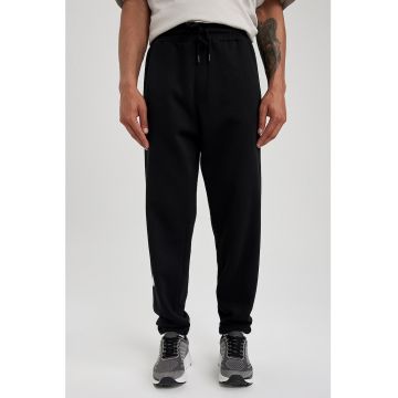 Pantaloni sport din amestec de bumbac cu imprimeu