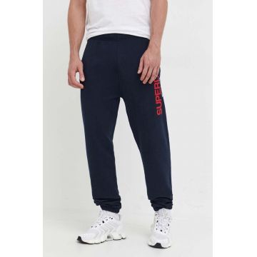 Superdry pantaloni de trening culoarea albastru marin, cu imprimeu