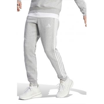 Pantaloni sport conici cu buzunare laterale