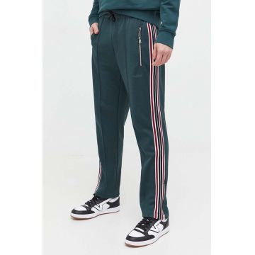 HUGO pantaloni de trening culoarea verde, cu imprimeu