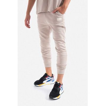 Alpha Industries pantaloni de trening din bumbac culoarea bej, cu imprimeu 118366.627-cream