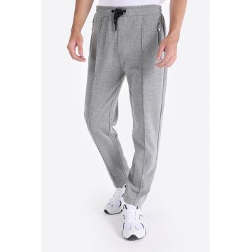 Pantaloni cu talie medie si buzunare oblice cu fermoar