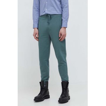 HUGO pantaloni de trening din bumbac culoarea verde, neted