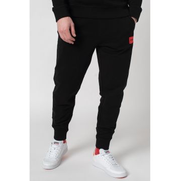 Pantaloni de trening cu buzunare oblice Doak - Negru