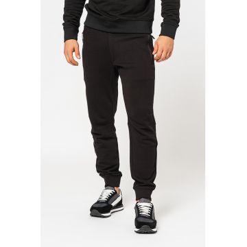 Pantaloni sport conici cu buzunare cu fermoar