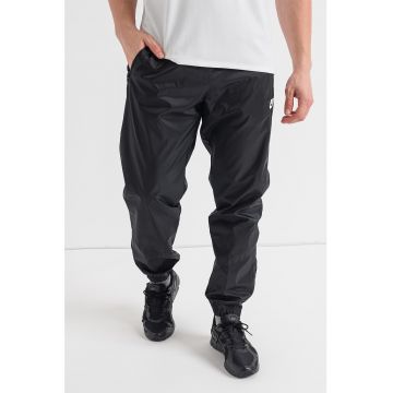 Pantaloni cu slituri cu fermoar la glezna Windrunner