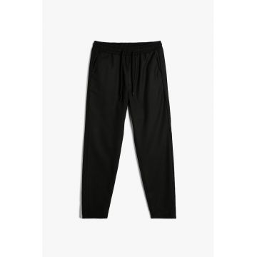 Pantaloni slim fit cu talie elastica