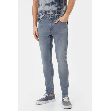 Blugi skinny cu aspect decolorat