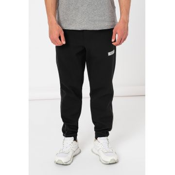 Pantaloni de trening cu buzunare cu fermoar