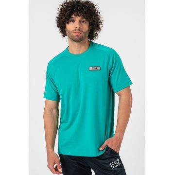 Tricou cu decolteu la baza gatului si maneci raglan