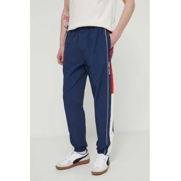 Tommy Jeans pantaloni de trening Archive Games culoarea bleumarin, cu model, DM0DM19539