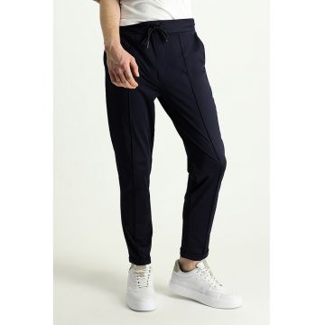 Pantaloni de trening cu buzunare oblice