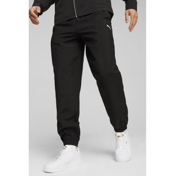 Pantaloni conici de trening