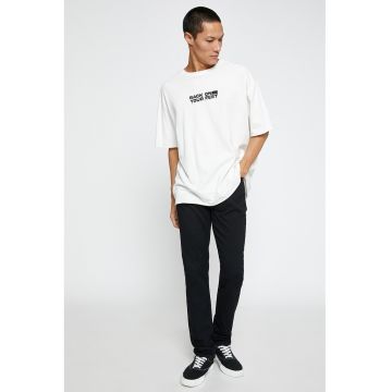 Blugi slim fit cu buzunare