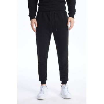 Pantaloni de trening cu snur si buzunare laterale