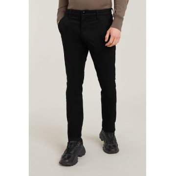 Pantaloni slim fit din amestec de bumbac organic