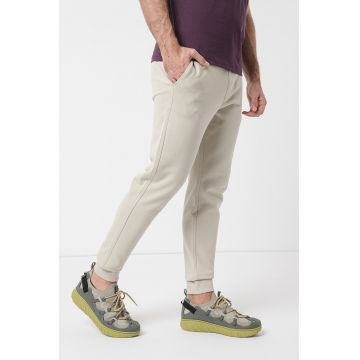Pantaloni de trening cu croiala conica si snur