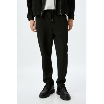Pantaloni cu snur si buzunare