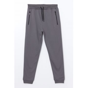 Pantaloni de trening cu buzunare cu fermoar