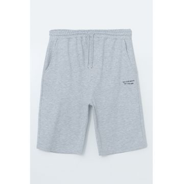 Pantaloni scurti cu buzunare laterale