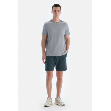 Pantaloni scurti cu buzunare oblice