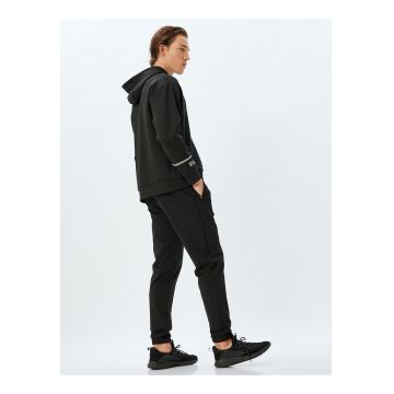 Pantaloni de trening conici cu snur