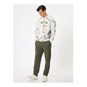 Pantaloni de trening din amestec de bumbac cu buzunare laterale